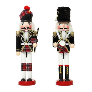 Close-up of 30cm wooden nutcracker soldiers with velvet hats and detailed uniforms
