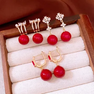 18K gold plated zircon earrings set featuring red beads and bowknot in jewelry box