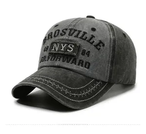 Detail of vintage washed denim baseball cap with premium 3D embroidery and star stitching