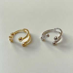 Detailed top view of irregular S925 sterling silver open rings in gold and silver finish