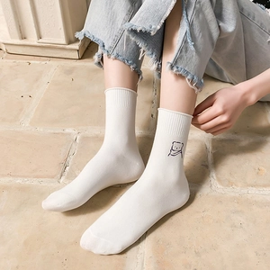 White cotton crew socks with minimalist bear embroidery and stylish rolled edge cuffs