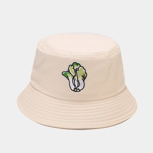 Detail of high-density cotton bucket hat with premium bok choy embroidery and stitching