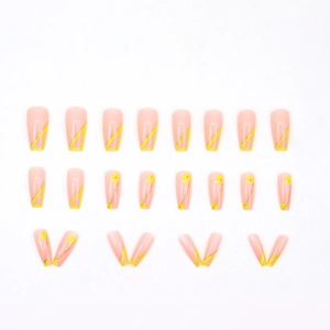 French long square press-on nails featuring yellow floral patterns and diagonal lines