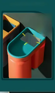 Close-up of orange and cyan wall-mounted bathroom organizer with spacious storage