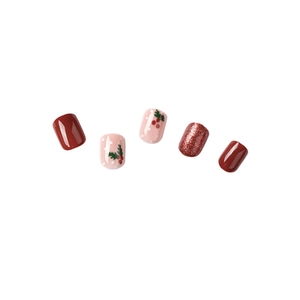 Christmas themed press-on nails with red holly berry designs and glitter finish