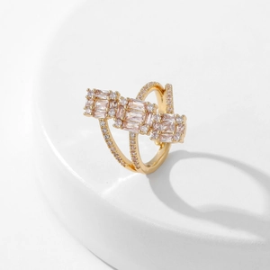 Gold-plated open ring with three pink rectangular zircons and micro-pave accents