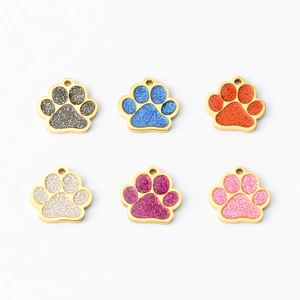 Colorful glittery paw-shaped stainless steel pet ID tags in six vibrant metal finishes
