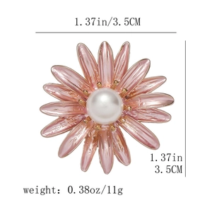 Pink enamel daisy brooch with pearl center including 1.37in size and 0.38oz weight specs