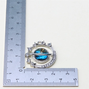 Star and moon planet pendant size detail shown with measurement scale for jewelry making