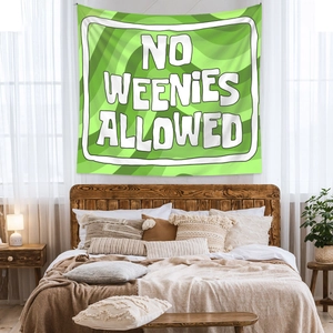 Detail of green wave tapestry featuring white No Weenies Allowed lettering in bedroom