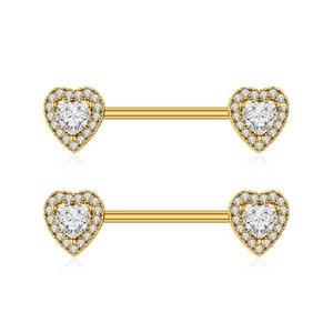 Detailed close-up of heart-shaped gold nipple rings with zircon stones on white background