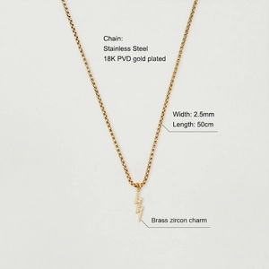 Detailed view of 18K gold plated stainless steel pearl chain with lightning bolt pendant