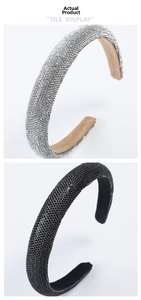 Close-up of sparkling rhinestone headbands in silver and black with padded velvet lining