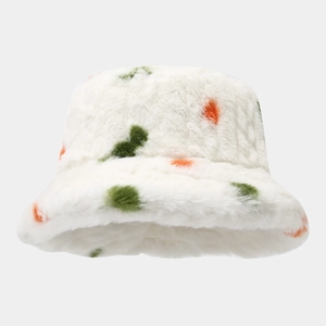 Detailed texture of plush bucket hat with green and orange floral pattern for winter