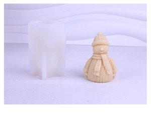 Detail of a silicone mold and the finished snowman candle with textured knit scarf