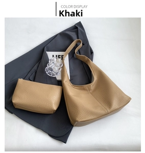 Two-piece khaki hobo bag set with matching pouch and lychee texture shown in a styled setup