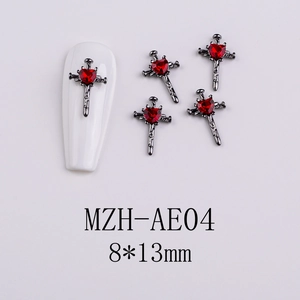 Detailed view of gunmetal gothic cross nail charms with red heart zircon 8x13mm size