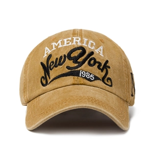 Vintage cotton baseball cap with New York embroidery in a washed mustard yellow finish