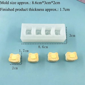 Macro detail of a 4-cavity bread silicone mold with yellow resin miniature loaves