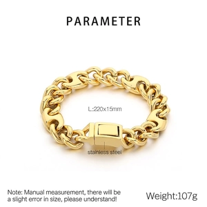 Detail of wide golden stainless steel Cuban chain and chunky nose link bracelet for men