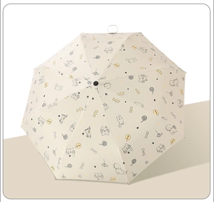 Detail of beige automatic folding umbrella with cute cartoon cat and dog pattern print