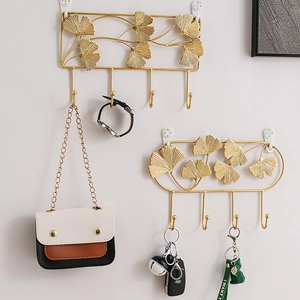 Golden ginkgo leaf metal wall hooks with four hangers for keys and coats
