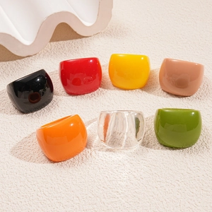 Colorful resin square rings in minimalist bold design with multiple vibrant glossy finishes