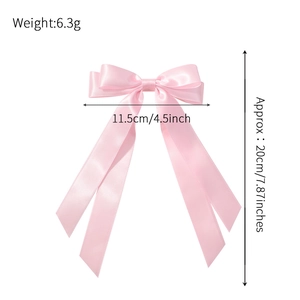 Pink satin double-layered bow hair clip with dimensions and weight measurements