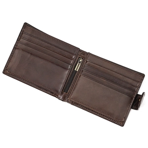 Detail view of dark brown leather tri-fold wallet with card slots and zipper pocket
