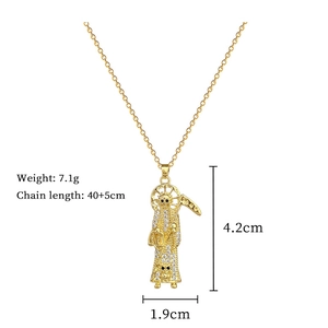 Detailed dimensions of a crystal Santa Muerte pendant on a gold titanium steel chain