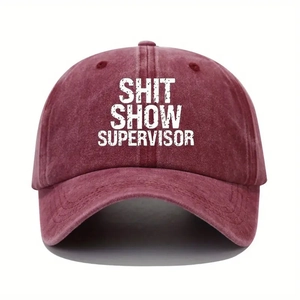 Detail of vintage washed burgundy baseball cap featuring Shit Show Supervisor print