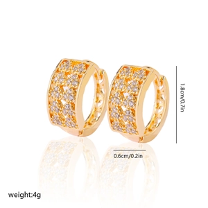 Detail shot of gold zircon earrings with dimensions 1.8cm by 0.6cm and weight 4g