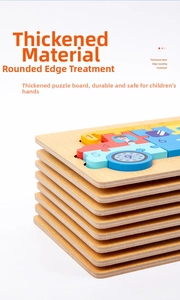 Close-up of thick wooden puzzle pieces with rounded edges and cartoon numbers