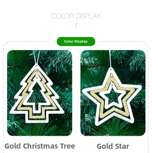 Detail of wooden gold Christmas tree and star ornaments with three-layer hollow design