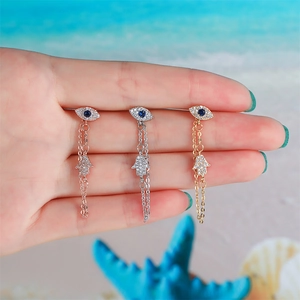 Hamsa Hand and Evil Eye drop earrings in gold, silver, and rose gold with zircon stones