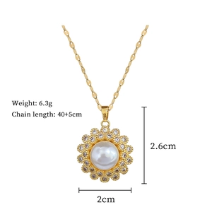Detail view of gold titanium necklace with pearl pendant and size specifications