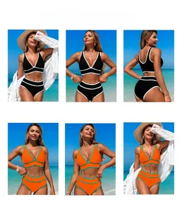 Detail of high-waisted contrast trim bikini set featuring sporty cut and quick-dry fabric