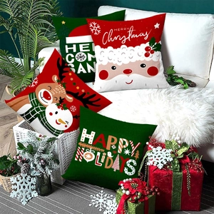 Lot de 4 housses de coussin de Noël avec Père Noël, renne et bonhomme de neige sur canapé