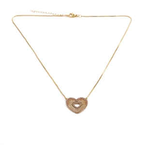 Detail of a gold heart pendant necklace with colorful cubic zirconia on box chain