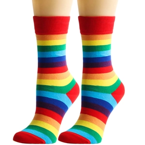 Rainbow striped mid-calf socks with red accents on white background model display