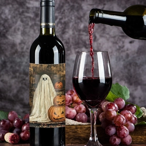 Halloween wine bottle stickers with ghost and pumpkin motifs for festive party decor
