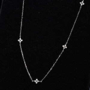 Elegant S925 sterling silver four-leaf flower necklace with sparkling zircon stones