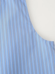 Close-up of premium blue and white vertical striped cotton fabric texture and stitching