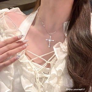 Star cross necklace featuring sparkling zircon pendant on a silver chain for women