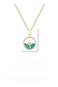 Detailed view of ocean star pendant necklace with cubic zirconia and blue resin