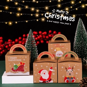 Detail of kraft paper Christmas gift boxes featuring Santa and Reindeer with handles