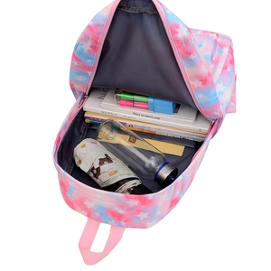 Pink galaxy tie-dye backpack showing spacious main compartment with grey lining