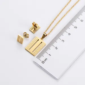 Gold-plated titanium steel jewelry set featuring Greek key patterns on necklace and earrings