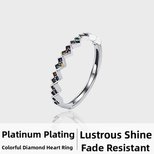 Detailed macro view of S925 silver ring featuring colorful zircon hearts and platinum plating
