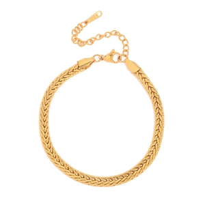 Detail of gold 18K stainless steel woven bracelet with lobster clasp and extension chain